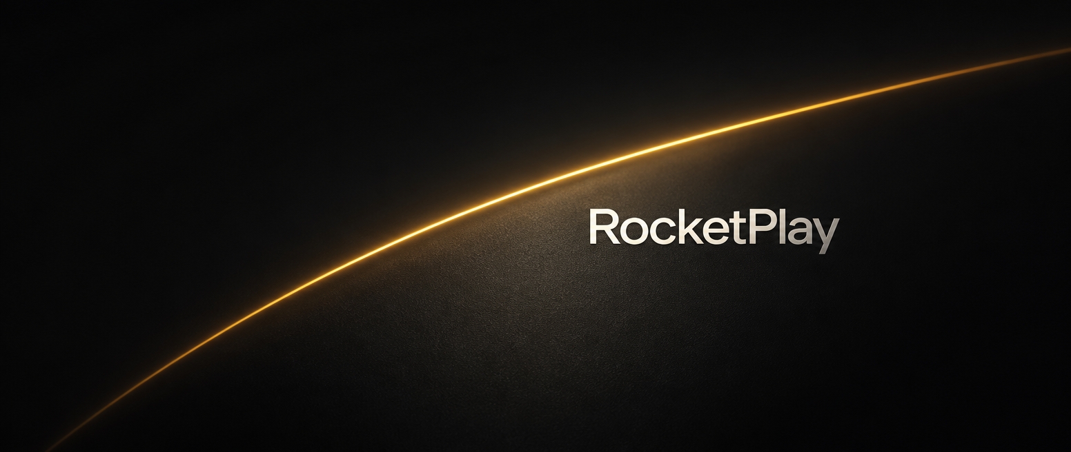 RocketPlay wordmark on a dark surface streaked with a thin amber arc of light